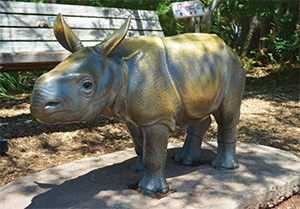Baby rhino sculpture by Tom Tishchler