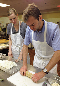 Couple in sushi making class at Platt College