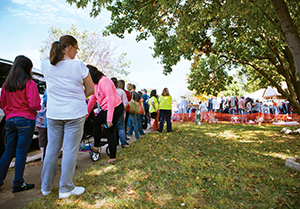A line of people waiting for the Down On Your Luck in Oklahoma garage sale