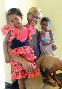 Matt Flick with children in Africa