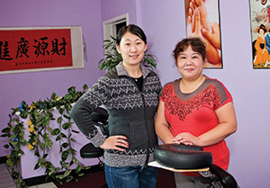 Tracy Lu and masseuse at China Healing Massage
