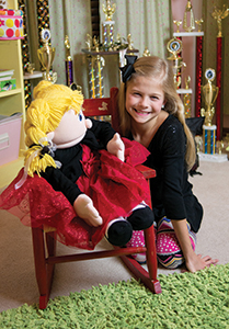 Darci Farmer and her puppet Katie