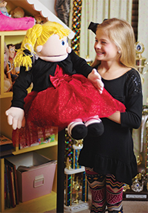 Darci Farmer and her puppet Katie