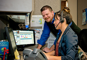 Staff member assists caller at Heartline