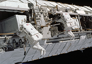 It took John Herrington and his fellow spacewalker, Michael Lopez-Alegria (red stripes on spacesuit) three different EVAs to attach the P-1 Truss onto the ISS.  The Truss was built in Tulsa and attached to the ISS by an Oklahoman. 