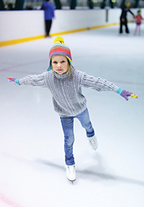 Young girl ice skating